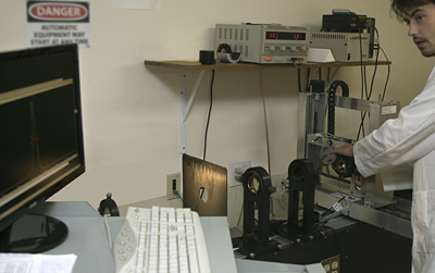 DayStar Filter technician tests Hi C H alpha filter spectroscopy.
